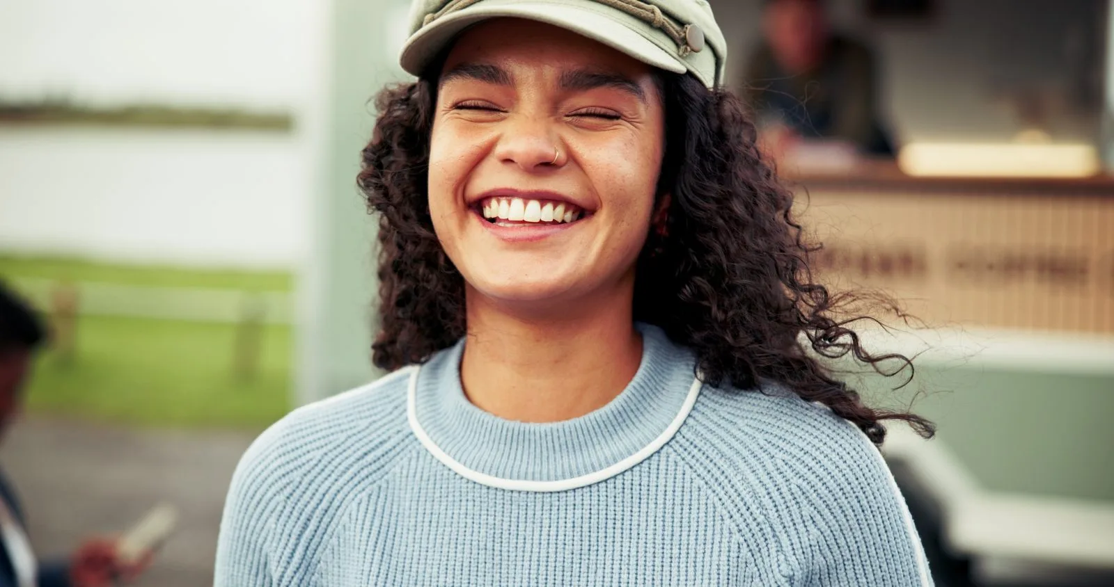 Smiling woman in a cap – online psychiatry in Spokane Valley, WA